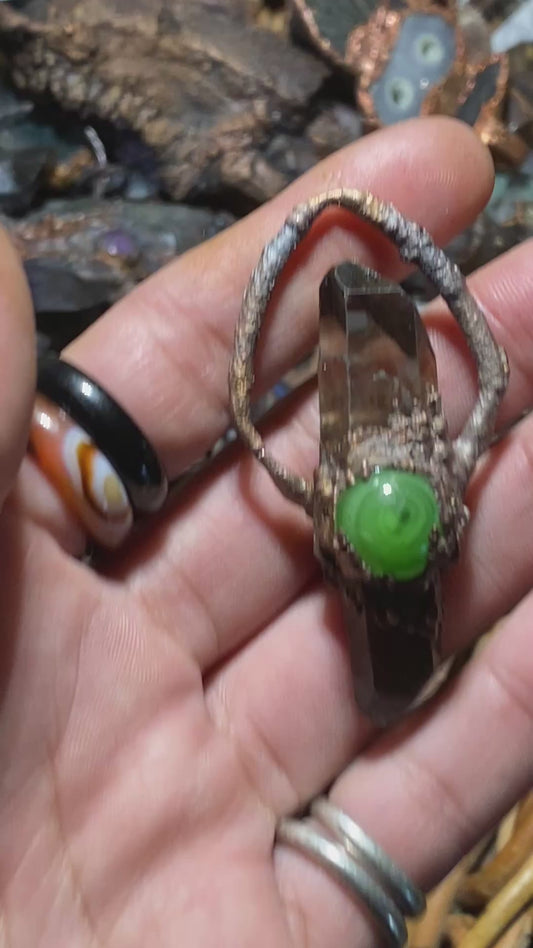 Glass bead and smoky quartz double terminated