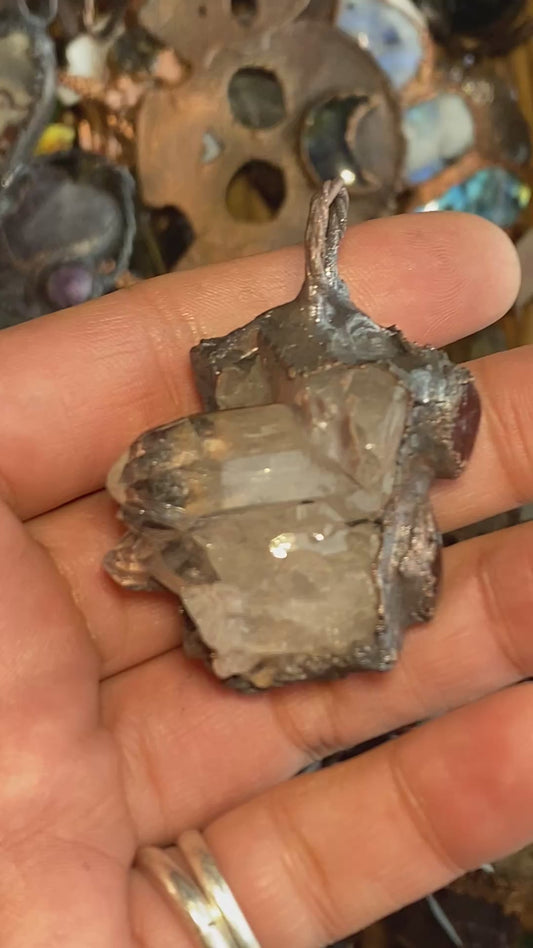 Lithium included, quartz cluster and garnets